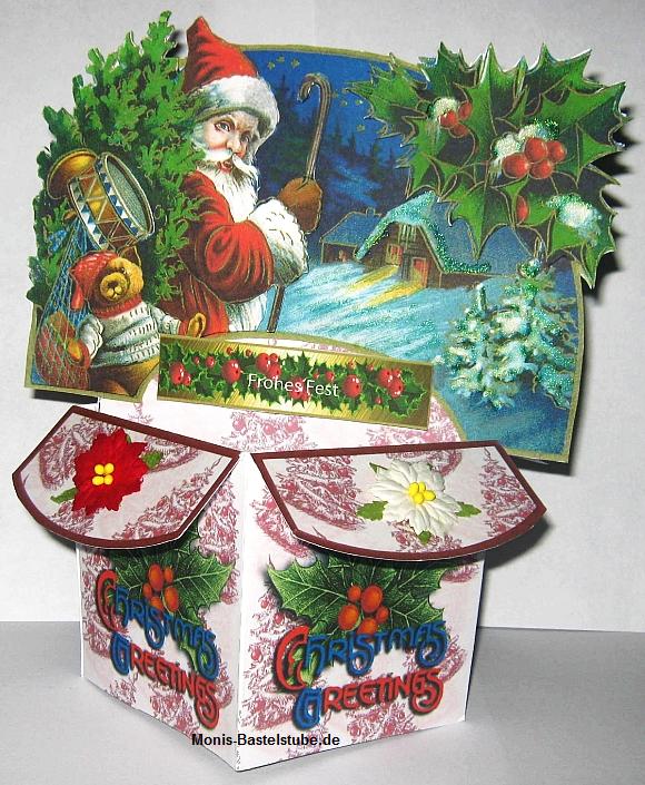 Popping-Box-Santa -Claus-auf-dem- Weg-ins-Dorf- Frohes-Fest.jpg