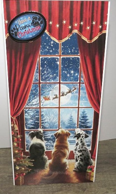 Grußkarte-Hunde-schauen-aus-dem-winterlichen-Fenster.jpg